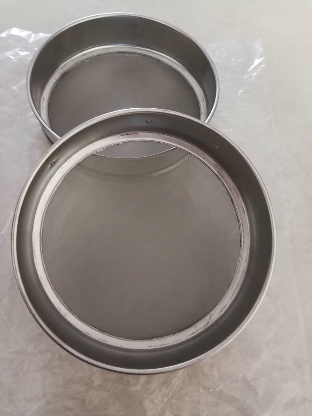 油漆涂料振动筛如何选择筛网的目数？